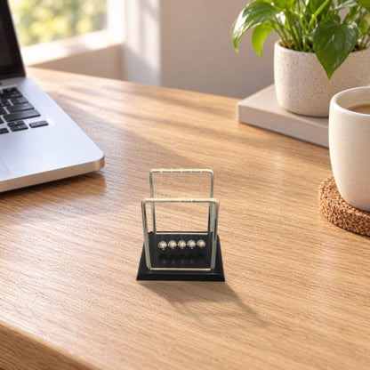 Mini Newton's cradle with five steel balls