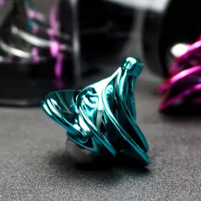 Teal spinning top