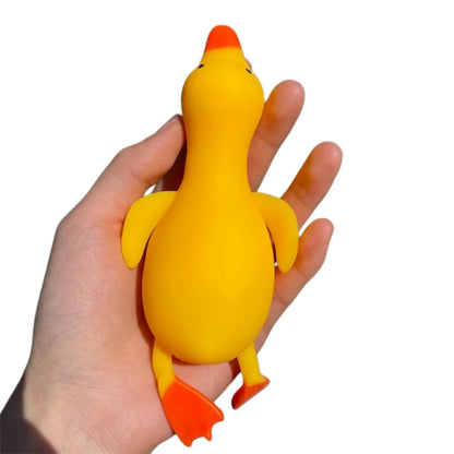 Hand holding a yellow squishy duck