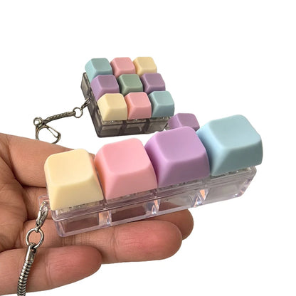 Hand holding a pastel key strip